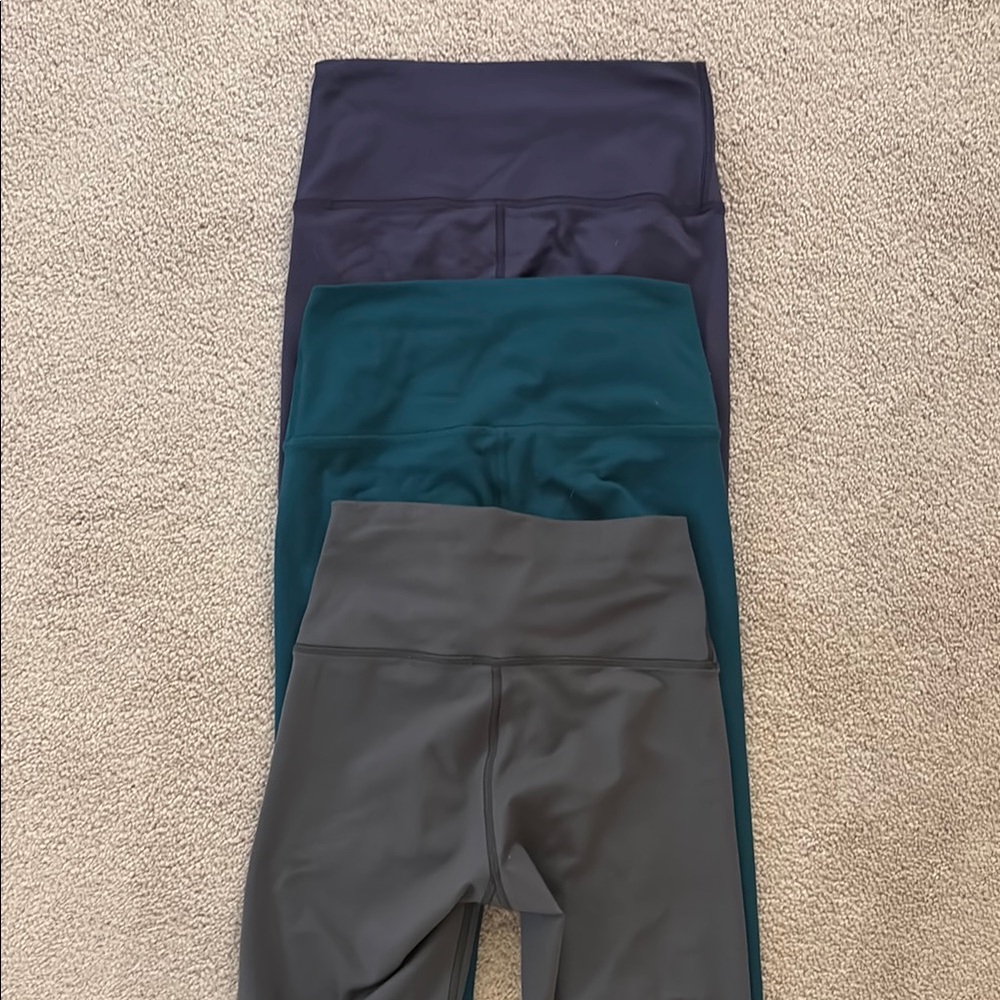 Fleo Women's Leggings in dark purple, Teal, and Charcoal